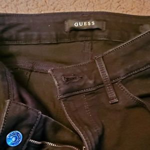 Size 26 black skinny guess jeans